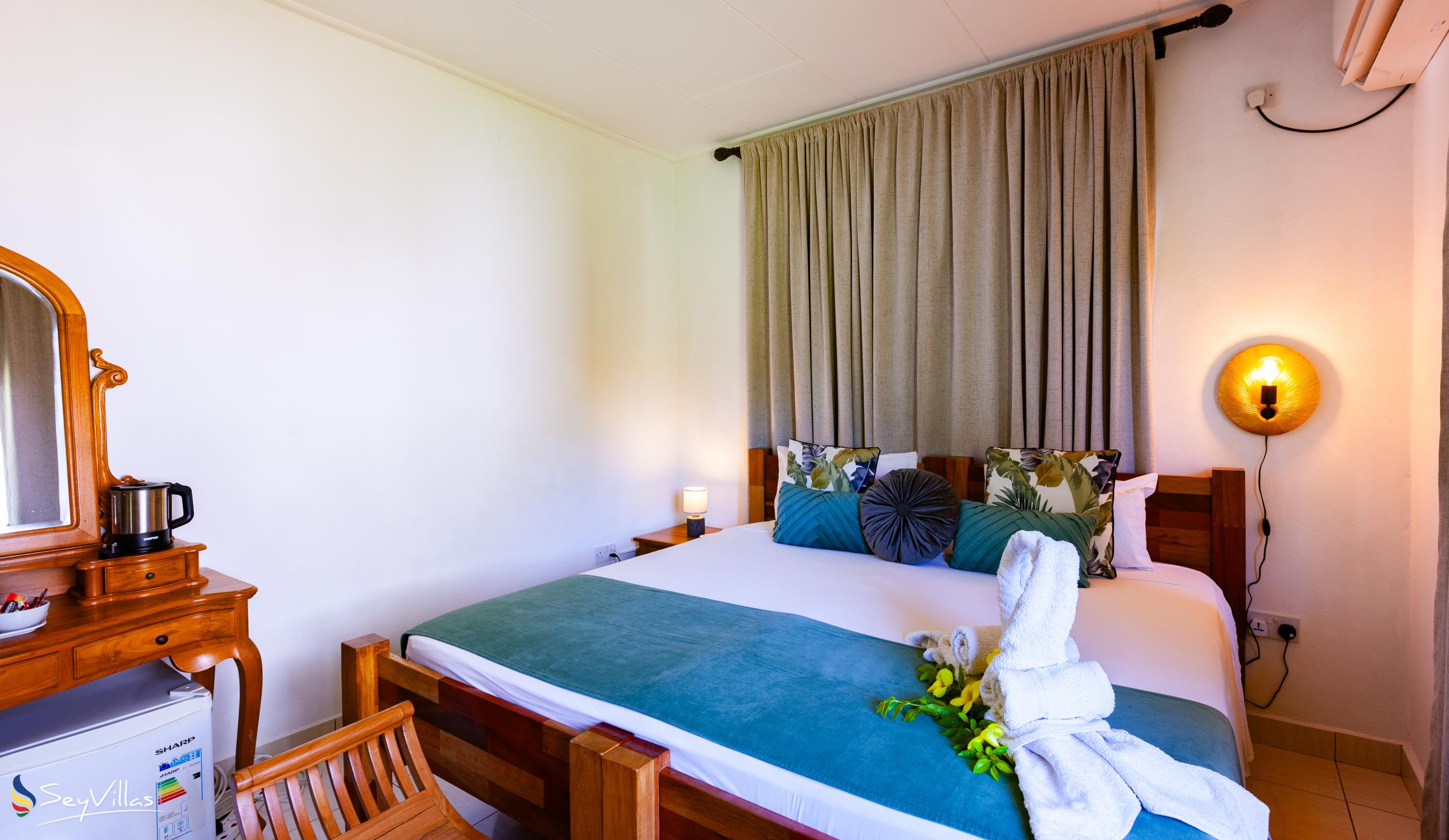 Foto 40: Lucy's Guesthouse - Chambre lits jumeaux (rez-de-chaussée) - La Digue (Seychelles)