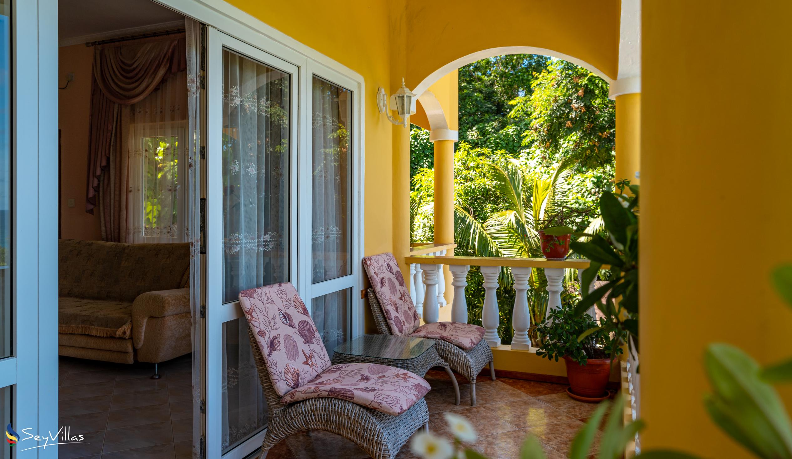 Foto 45: SeyBreeze Villa Guest House - Camera Deluxe con balcone e vista mare - Mahé (Seychelles)